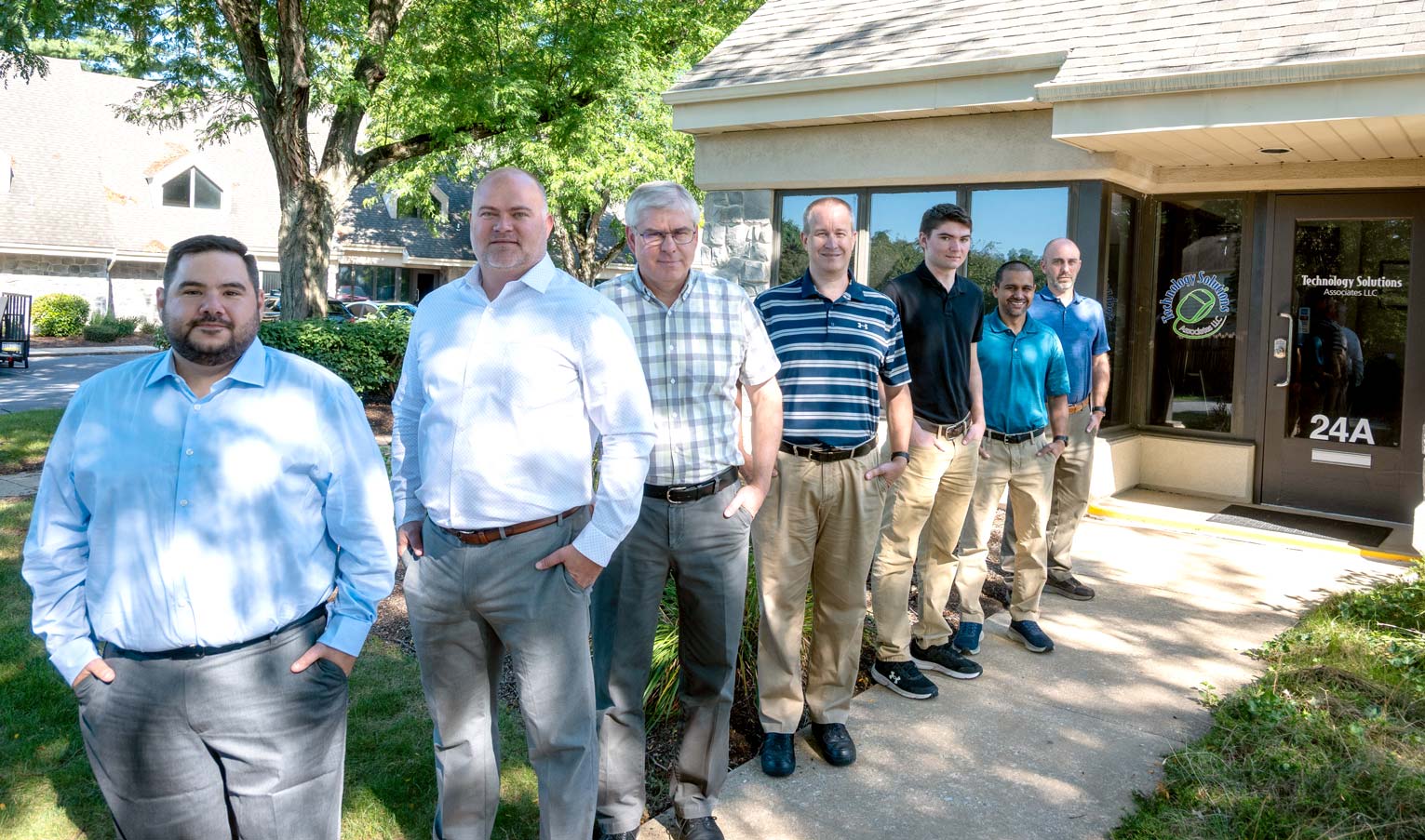 techsolutions-team-standing-outside TechSola Team Standing Outside Lancaster Office